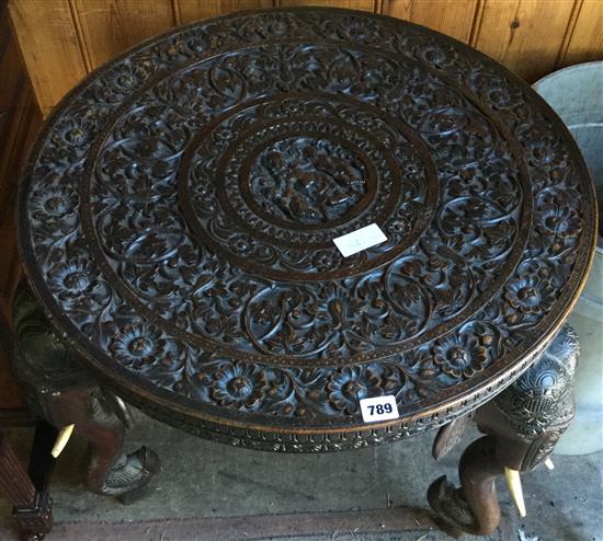 Circular carved elephant table